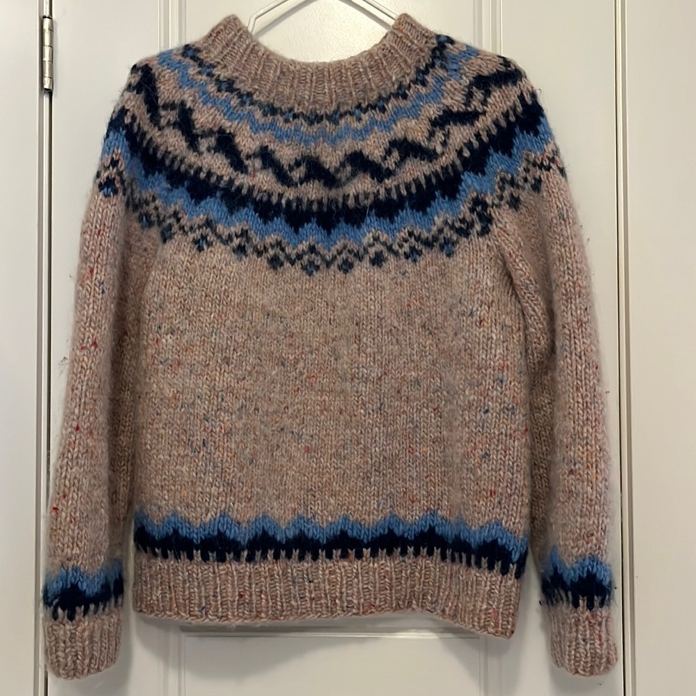 Beautiful cream and blue knit sweater. So warm and cozy.